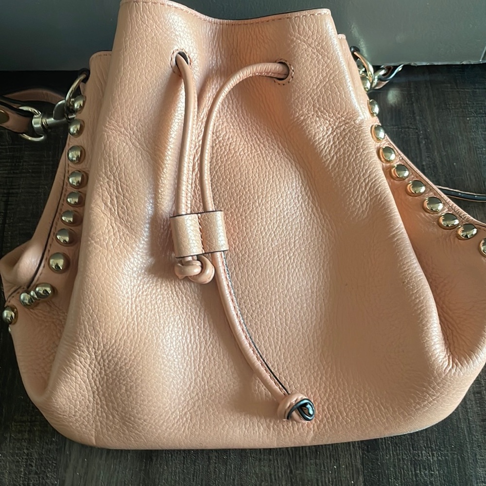 Rebecca Minkoff pink bucket bag with long strap